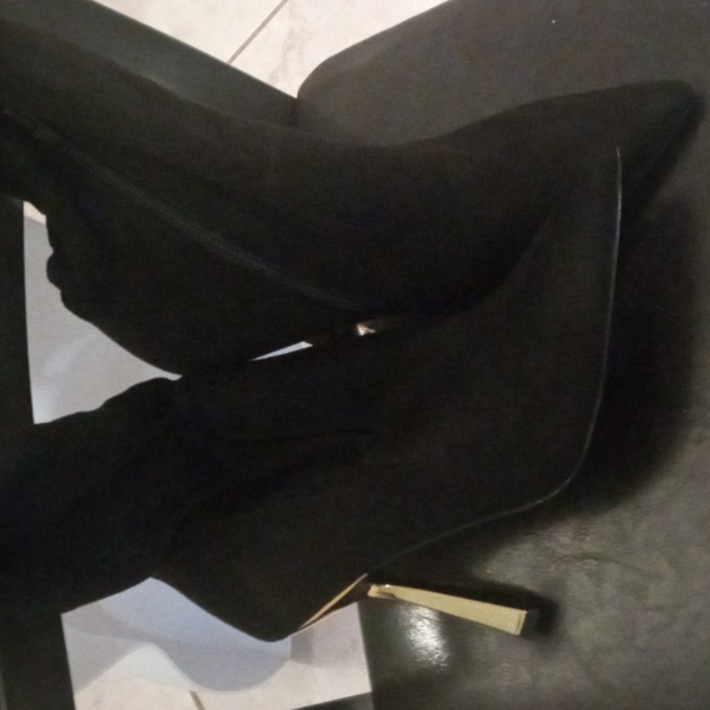 Black Steve Madden thigh high boots